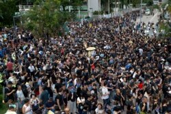 Protesters gather at Po Tsui park as they take part in the anti-extradition bill protests march in Hong Kong, Aug. 4, 2019.