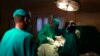 FILE - Doctors are seen operating on a cancer patient in a hospital. (Photo - Rael Ombuor/VOA)