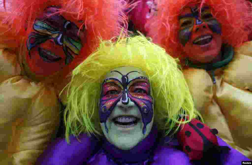 Women dressed in costumes for &quot;Weiberfastnacht&quot; (Women&#39;s Carnival) celebrate in Cologne, Germany.