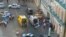 In this image provided by the Moscow Traffic Control Center Press Service, ambulance and police work at the site of an incident in which a taxi struck pedestrians on a sidewalk near Red Square in Moscow, June 16, 2018.