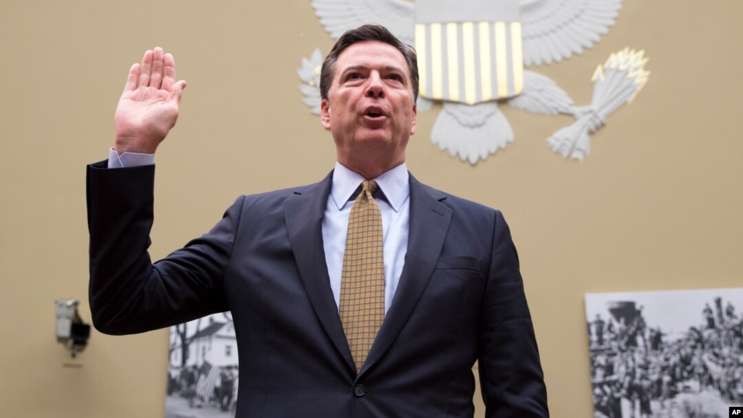 FILE - FBI Director James Comey is sworn in on Capitol Hill in Washington, July 7, 2016, prior to testifying before the House House Oversight and Government Reform Committee hearing to explain his agency's recommendation to not prosecute Democratic presidential candidate Hillary Clinton over her private email setup.
