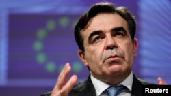 FILE - European Commission Vice President Margaritis Schinas speaks during a news conference at the EU headquarters in Brussels, Belgium, Jan. 19, 2021.