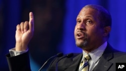 FILE - Author and talk show host Tavis Smiley speaks at Book Expo America in New York, May 29, 2014. 