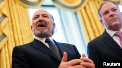 Howard Lutnick, U.S. President Donald Trump's pick to be commerce secretary, speaks in the Oval Office at the White House, in Washington, Feb. 14, 2025. Lutnick was confirmed by the Senate on Feb. 19.