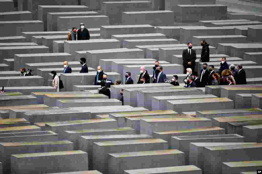 German Foreign Minister Heiko Maas, gesturing at center, visits the Holocaust Memorial in Berlin with his counterparts from Israel Gabi Ashkenazi, below 4th right from center, and Sheikh Abdullah bin Zayed Al Nahyan from the UAE, 2nd right from center.