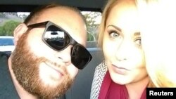 Christopher Roybal, left, is seen with his wife, Dixie Roybal, in this undated social media photo obtained by Reuters, Oct. 3, 2017. 