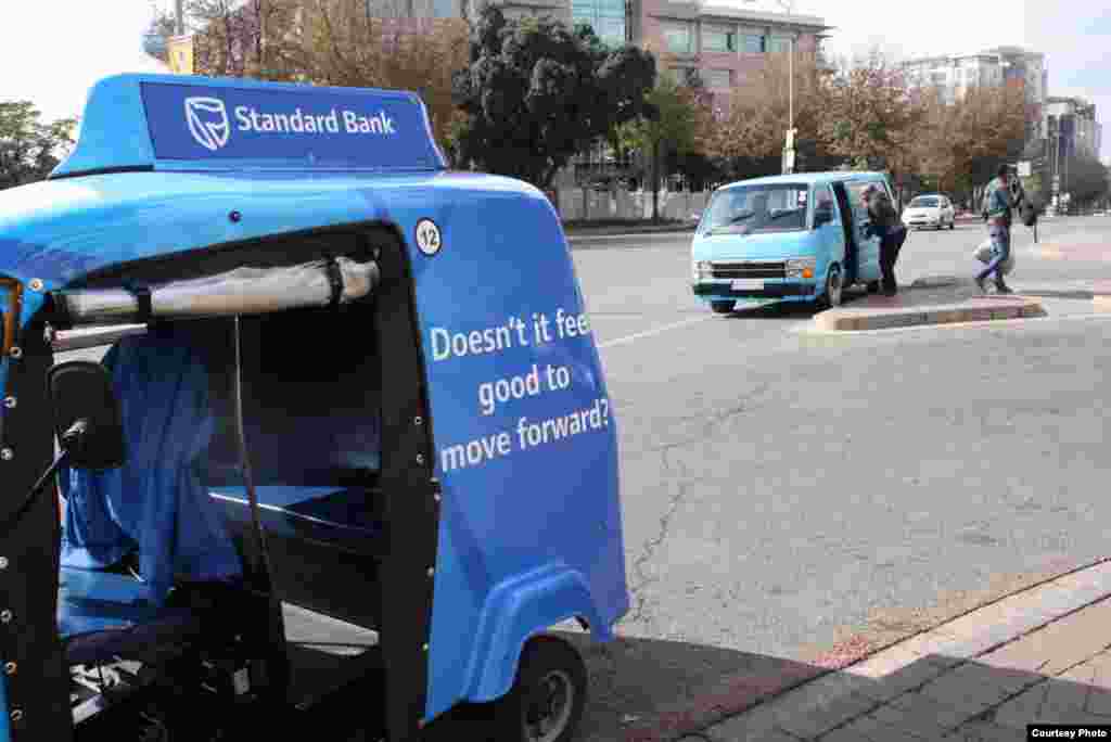 Johannesburg&rsquo;s notorious minibuses don&rsquo;t like stiff competition from the cheaper tuk tuks so the little &lsquo;buzzing bees&rsquo; avoid turf battles by limiting their territory. (Photo by Darren Taylor)