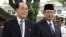 Kim Yong-nam, left, North Korea's president of the Presidium of the Supreme People's Assembly, and Indonesian President Susilo Bambang Yudhoyono walk to a greeting ceremony at the Merdeka Palace, Jakarta, May 15, 2012.
