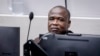 FILE - Dominic Ongwen sits in the court room to listen to the Appeals Chamber of the International Criminal Court's judgment on the defense's appeals against his conviction and sentence in The Hague, Netherlands, Dec. 15, 2022. 