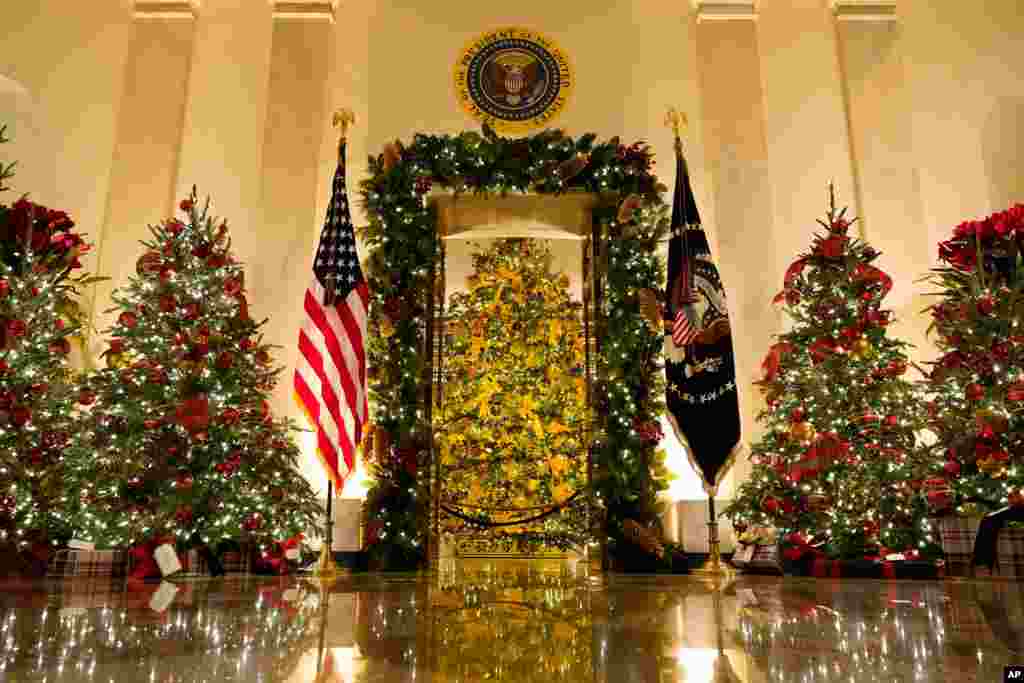 Cross Hall and the Blue Room are decorated during the 2020 Christmas preview at the White House in Washington.