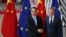 China's Premier Li Keqiang, left, shakes hands with European Council President Donald Tusk during an EU-China summit at the European Council headquarters in Brussels, Belgium, April 9, 2019.
