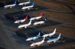 FILE - An aerial photo shows Boeing 737 MAX aircraft at Boeing facilities at the Grant County International Airport in Moses Lake, Wash., Sept. 16, 2019.