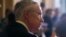 Senate Majority Leader Harry Reid of Nevada speaks to reporters as lawmakers moved toward resolving their feud over filibusters of White House appointees on Capitol Hill in Washington, Jul. 16, 2013. 