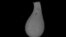A tiny sand-grain-size tektite, thought to be created when vaporized material from an impact solidified while flying through the air, is shown in this image released in New York, Oct. 13, 2016.