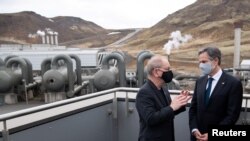U.S. Secretary of State Antony Blinken speaks with CEO of Reykjavik Energy Bjarni Bjarnason during a tour to the Hellisheidi Geothermal Plant, in Hengill, Iceland, May 18, 2021. 