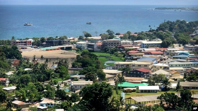 FILE - Ships are docked offshore in Honiara, the capital of the Solomon Islands, on November 24, 2018. (AP Photo/Mark Schiefelbein, File)