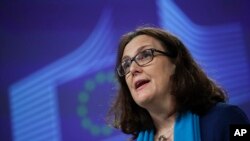 FILE: European Trade Commissioner Cecilia Malmstrom talks to journalists during a news conference at the European Commission headquarters in Brussels, Monday, April 15, 2019. (AP Photo/Francisco Seco)