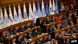 FILE - Participants of the Italy-Africa international conference 'A bridge for common growth’ listen to speeches at the Italian Senate in Rome on January 29, 2024. 