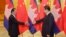 FILE: Cambodian Prime Minister Hun Sen, left, shakes hands with China's President Xi Jinping before a meeting at the Great Hall of the People in Beijing Friday, Nov. 7, 2014. (AP Photo/Jason Lee, Pool)