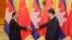 Cambodian Prime Minister Hun Sen, left, shakes hands with China's President Xi Jinping before a meeting at the Great Hall of the People in Beijing Friday, Nov. 7, 2014. (AP Photo/Jason Lee, Pool)