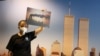 Docent Joan Mastropaolo shares her first-person account of the September 11, 2001, attacks with students during a tour at the 9/11 Tribute Museum in New York City, August 26, 2021. (REUTERS/Caitlin Ochs)