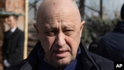 FILE - Yevgeny Prigozhin, the owner of the Wagner Group military company, arrives during a funeral ceremony at the Troyekurovskoye cemetery in Moscow, Russia, April 8, 2023.