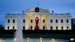 (FILE) The White House in Washington is decorated to commemorate World AIDS Day.