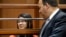 FILE - Alejandra Guerrero (L) appears in Los Angeles Superior Court, Jan. 12, 2015 with her attorney Errol Cook (R) as one of four defendants being charged in connection to the 2014 beating death of USC graduate student Xinran Ji student during an attempted robbery.