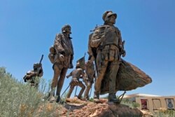 This bronze statue of Don Juan de Oñate leading a group of Spanish settlers in 1598 stands outside the Albuquerque Museum in Albuquerque, N.M., June 12, 2020. Two statues of Spanish conqueror Juan de Oñate in New Mexico are drawing renewed criticism.
