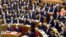 Members of the Hungarian parliament are pictured prior to a vote on an amendment to the constitution during a plenary session of the legislature, in Budapest, Hungary, Nov. 8, 2016.