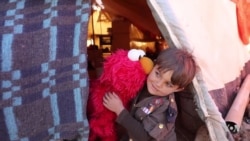 Elmo and Friends Lead Education Effort for Refugee Children