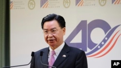 FILE - Taiwan's Foreign Minister Joseph Wu speaks during a press conference at the American Institute in Taiwan, in Taipei, March 19, 2019. 