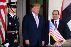 FILE - President Donald Trump welcomes visiting Egyptian President Abdel Fattah el-Sissi to the White House, in Washington, April 9, 2019.