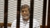 Morsi sentenciado a 20 años de cárcel