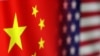 FILE - Chinese and U.S. flags are seen in this illustration created on Jan. 30, 2023.