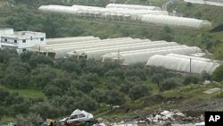 A tank in the Syrian port city of Banias, April 10, 2011, after security forces sealed off the city overnight