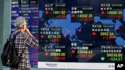 Indicadores de la bolsa de Tokio. La economía mundial crece menos de lo esperado.