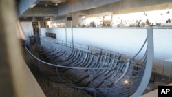 An 11th century, 15-meter Viking ocean-going trading vessel, built in the Nordic clinker boat tradition, sits on display at the Viking Ship Museum. Roskilde, Denmark, Jan. 17, 2022. 