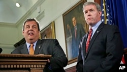 New Jersey Governor Chris Christie (l) nominates Attorney General Jeffrey Chiesa to temporarily fill the U.S. Senate seat that opened up after Senator Frank Lautenberg's death, June 6, 2013, in Trenton, New Jersey.