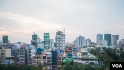 The overview shows a construction boom of new condominiums and apartment buildings in Phnom Penh, Cambodia, Thursday, December 15, 2016. (Khan Sokummono/VOA Khmer)