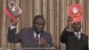 FILE: Zimbabwe Prime Minister and Movement For Democratic Change (MDC) leader Morgan Tsvangirai (L) and National Organising Secretary Nelson Chamisa present a booklet at the launch of Conditions for a Sustainable Election in Zimbabwe (COSEZ) in Harare, March 8