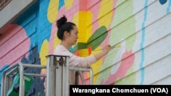 Amanda Phingbodhipakkiya, a multidisiciplinary artist and speaker based in Brooklyn, New York, painted a mural in Washington, D.C. in May, 2021.