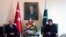 Turkey's President Recep Tayyip Erdogan, left, and Pakistan Prime Minister Imran Khan pose for photos before a meeting, in Islamabad, Pakistan, Feb. 14, 2020.