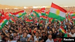 Warga Kurdi di Duhuk, Irak menghadiri kampanye untuk mendukung rencana referendum kemerdekaan Kurdi 25 September.