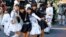 Star Wars fans dressed in costumes of Star Wars characters pose for a photo during a Halloween parade in Kawasaki, near Tokyo, Oct. 25, 2015.