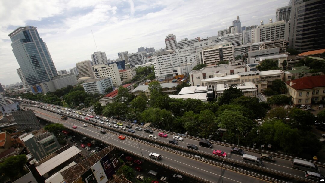 FILE - Cars cross the Thai-Japanese friendship bridge in Bangkok, Thailand.