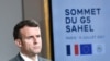 Le président français Macron réagit lors d'une conférence de presse conjointe avec le président nigérien à Paris, le 9 juillet 2021, à la suite d'un sommet vidéo avec les dirigeants des pays du G5 Sahel.