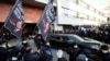 A hearse carrying the body of the late former South Korean President Chun Doo-hwan leaves a funeral hall in Seoul, South Korea, Nov. 27, 2021.