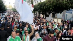Demonstrators shout slogans during an anti-government rally in Algiers, Algeria Dec. 27, 2019.