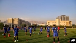 Iran's national men's football team take part in a training session a day before their Group A match against Syria during the 2018 FIFA World Cup Russia Qualifier, in Tehran, Iran, Sept. 4, 2017.